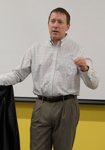 Professor Fabrizi speaking in front of class
