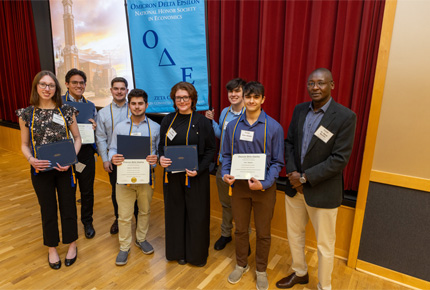 Members of the Economics honors society, Omicron Delta Epsilon