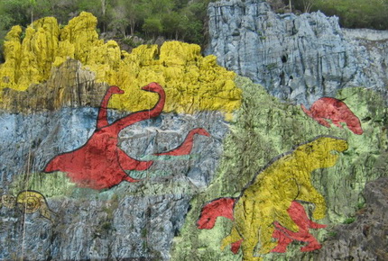 Colorful mural on a cliff side in Cuba