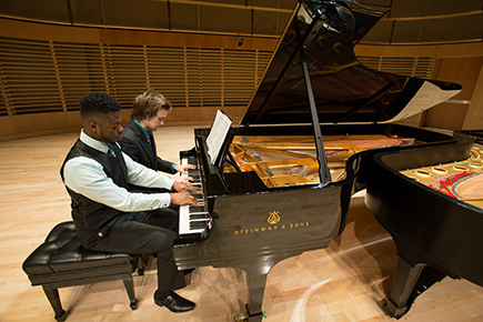 Students playing piano