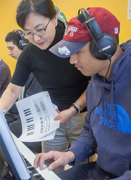 Students playing piano