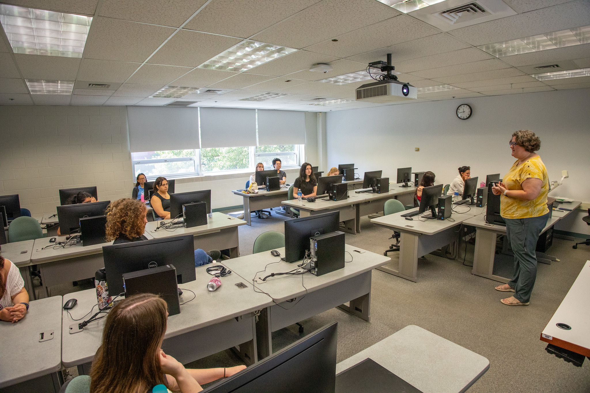 students sitting in computer classroom