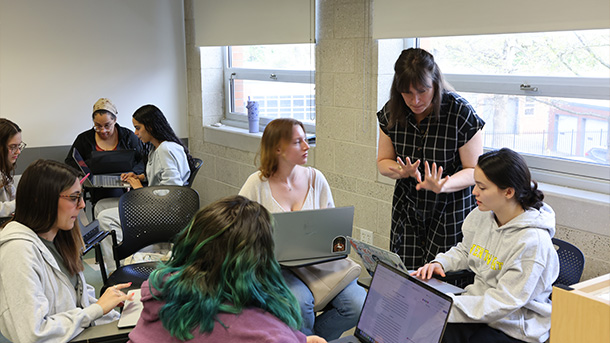 professor talking to students during class