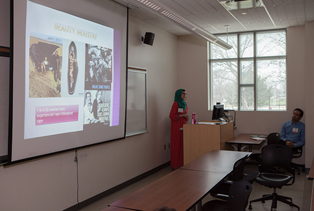 woman teaching with slide show on screen