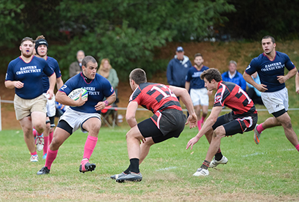 men's rugby team in action