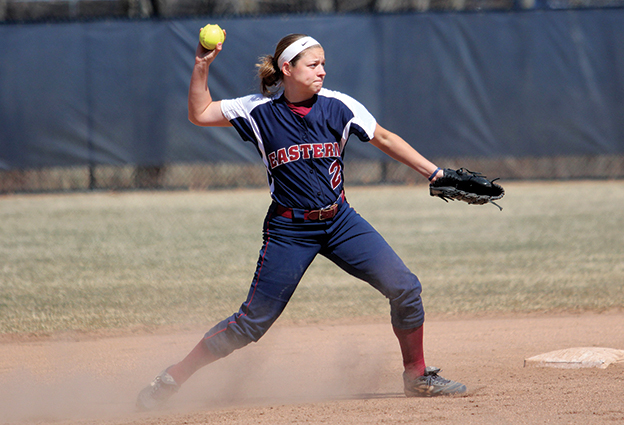 softball player throwing the ball