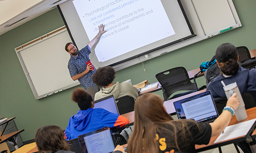 Professor lecturing in front of class
