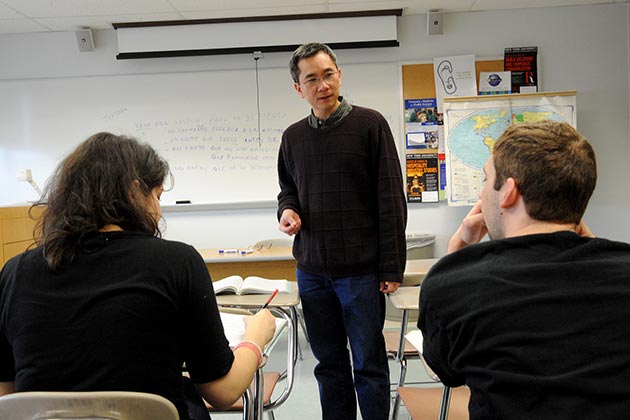 Professor teaching in front of class