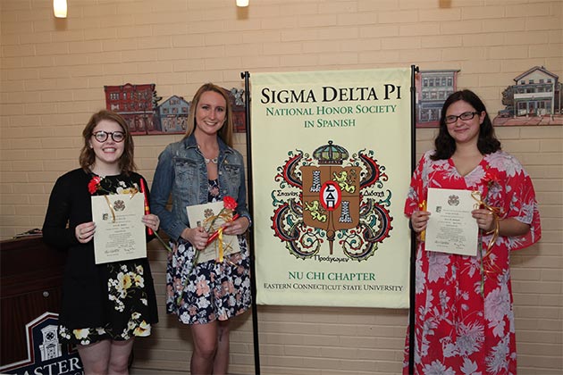 Students from the honor society posing for a photo